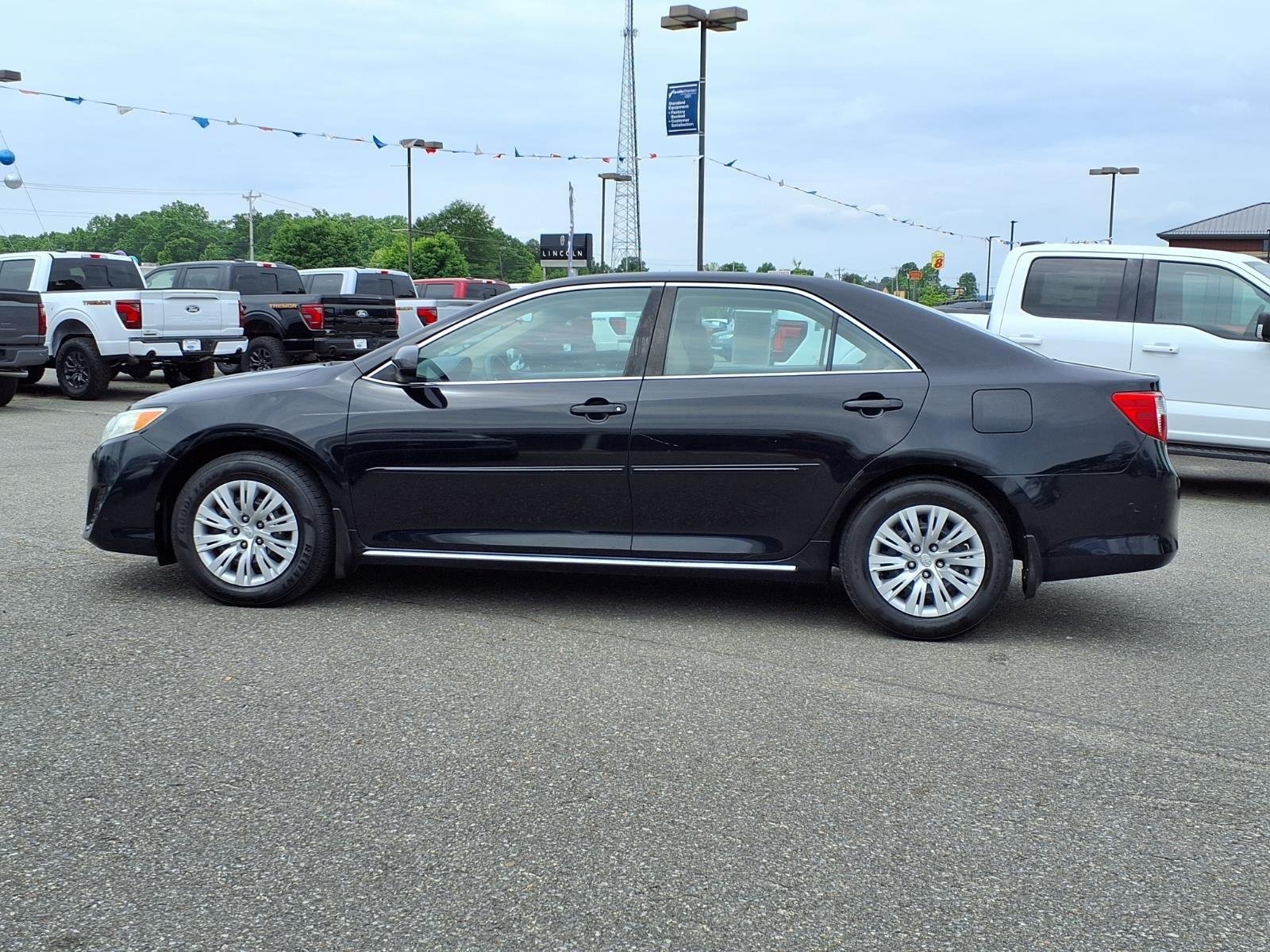 Used 2012 Attitude Black Metallic Toyota LE image 3