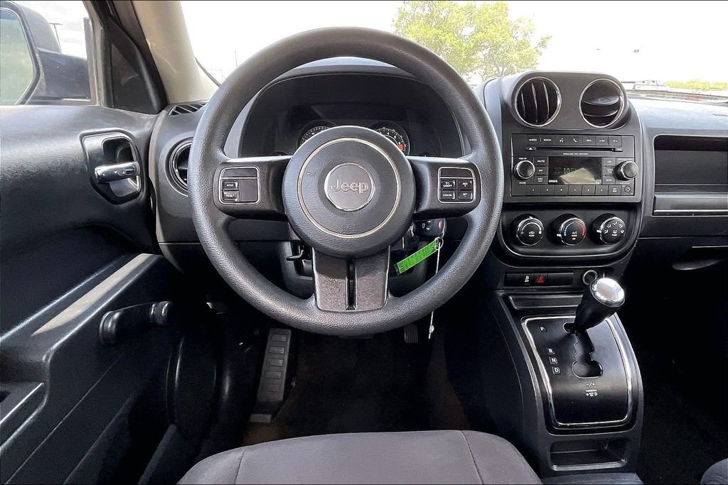 Used 2016 Maximum Steel Metallic Jeep Sport image 8