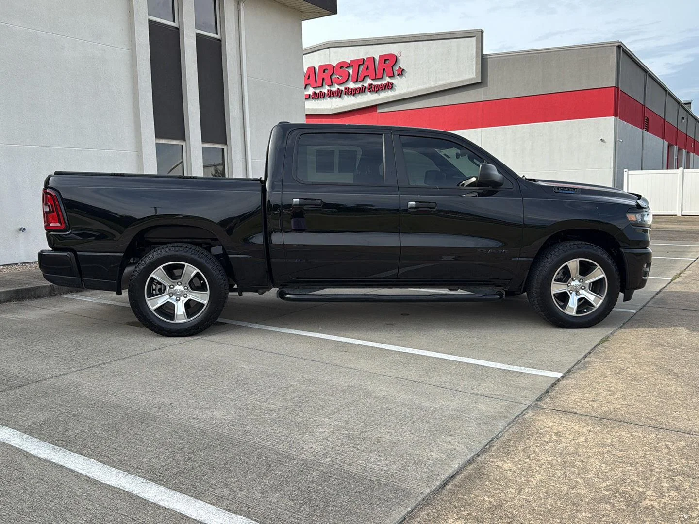 Used 2025 Diamond Black Crystal Pearlcoat Ram Tradesman image 8