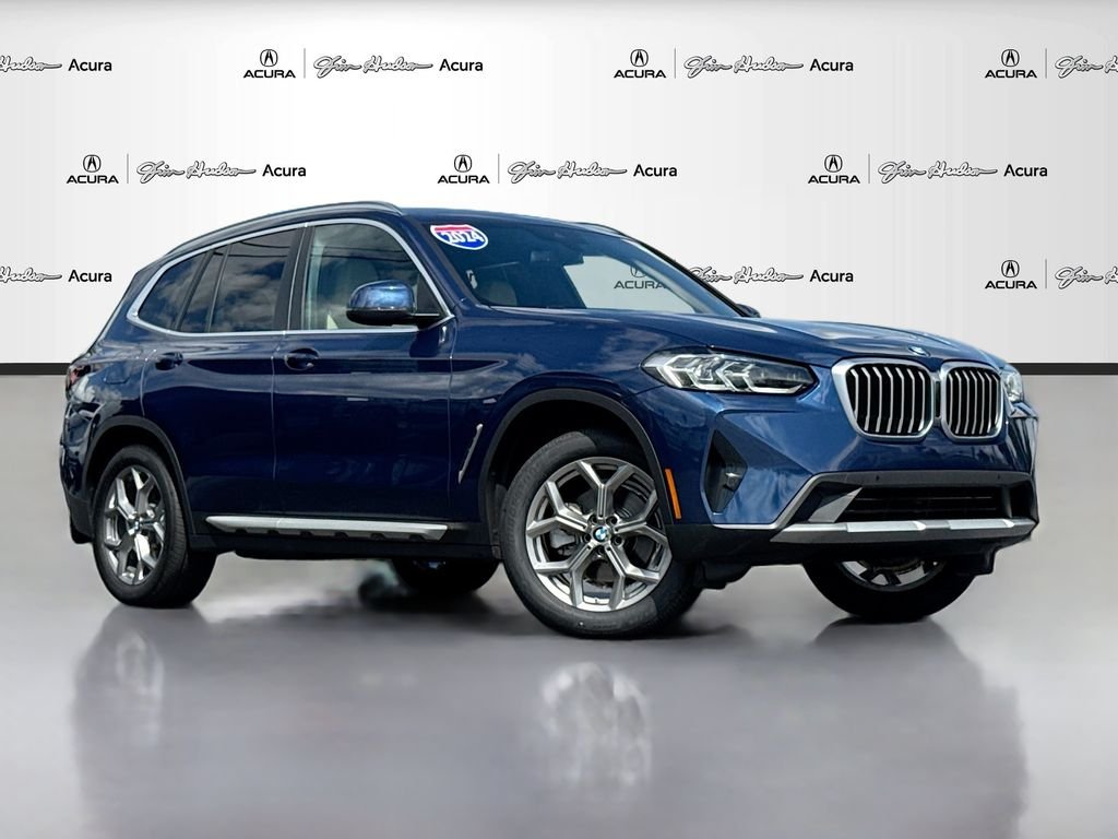 Used 2024 Blue BMW sDrive30i image 1