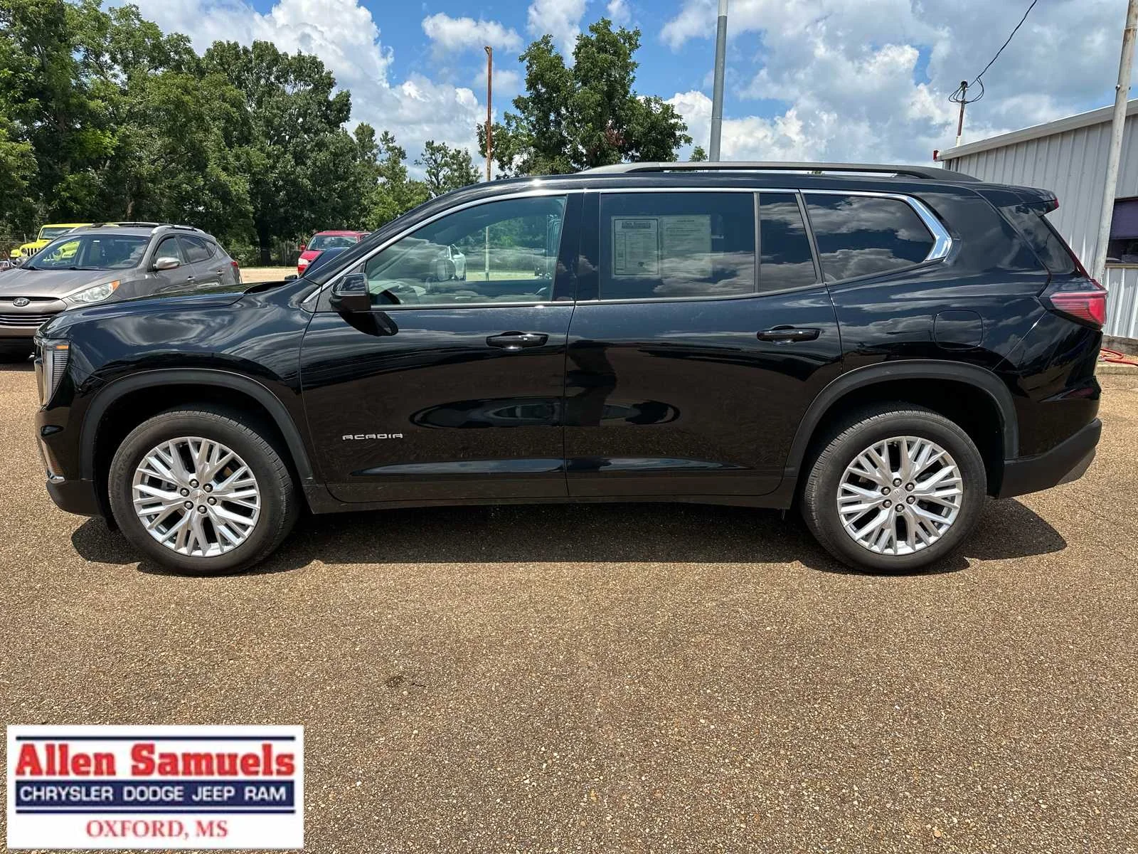 Used 2026 Ebony Twilight Metallic GMC FWD Elevation image 7