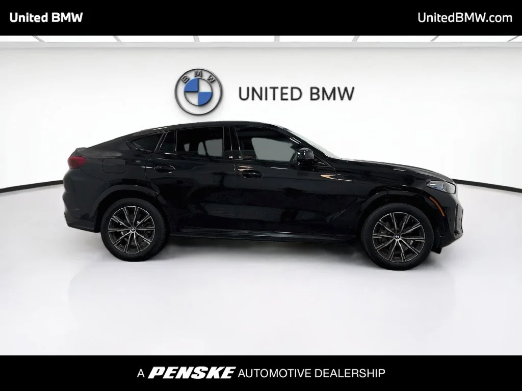 Certified Used 2025 Black Sapphire Metallic BMW xDrive40i image 4