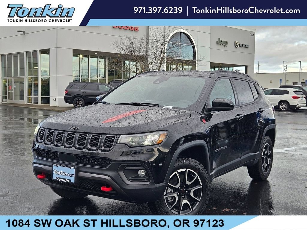 Used 2026 Diamond Black Crystal Pearlcoat Jeep Trailhawk image 1