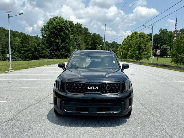 Used 2024 Black Kia EX X-Line image 7