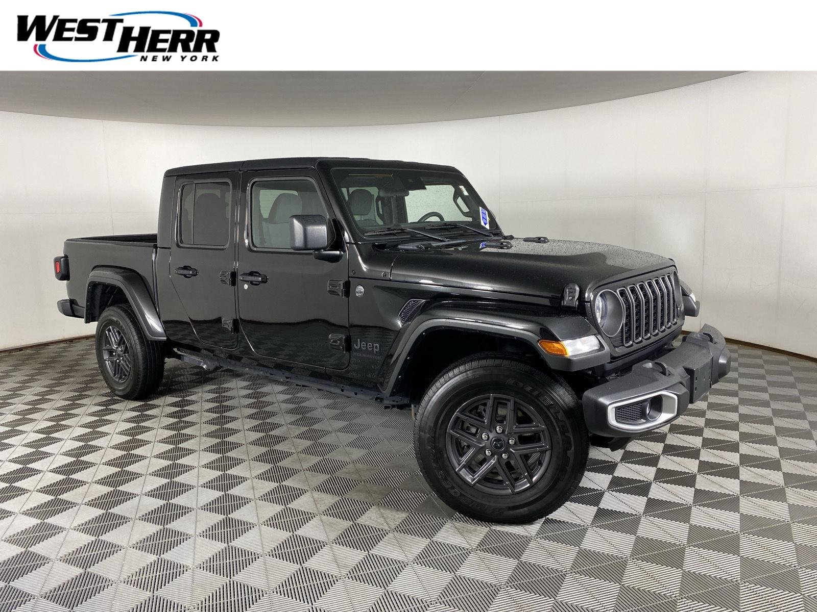 Used 2024 Black Clearcoat Jeep Sport S image 1
