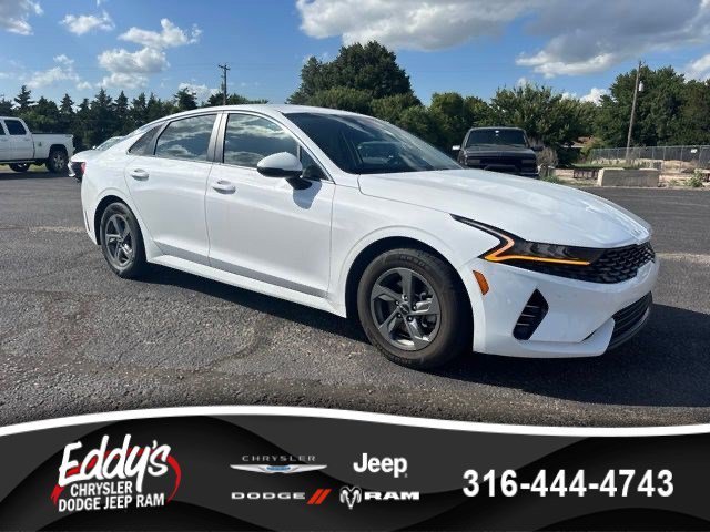 Used 2022 Glacial White Pearl Kia LX image 1