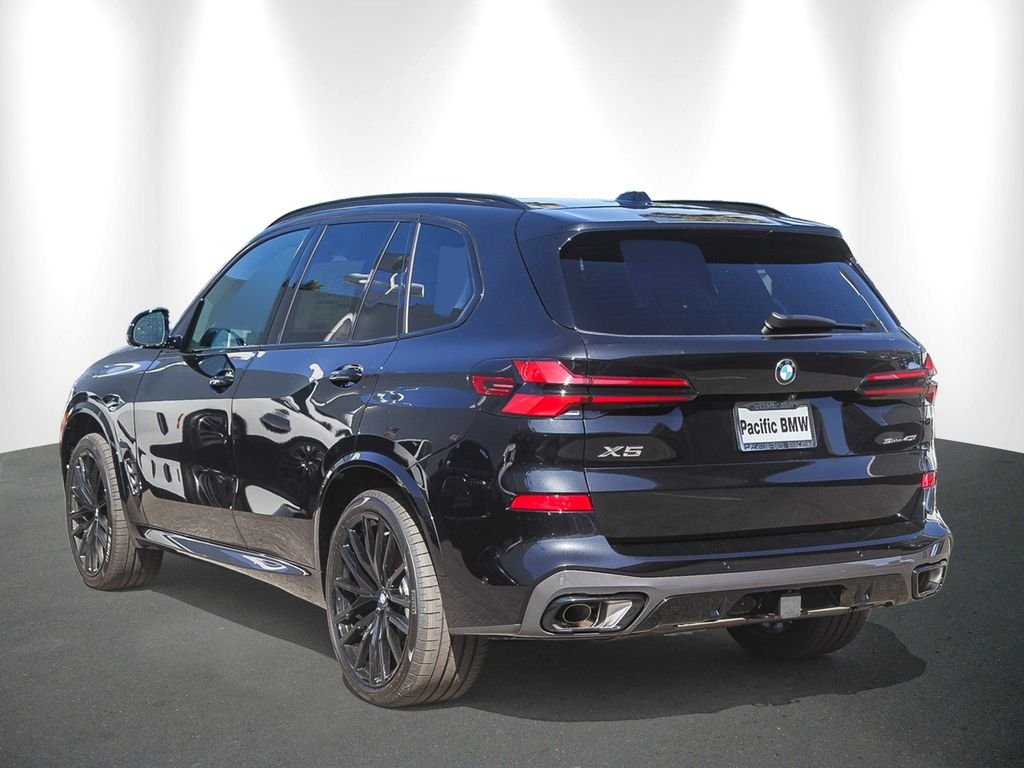 New 2026 Black Sapphire Metallic BMW sDrive40i image 4