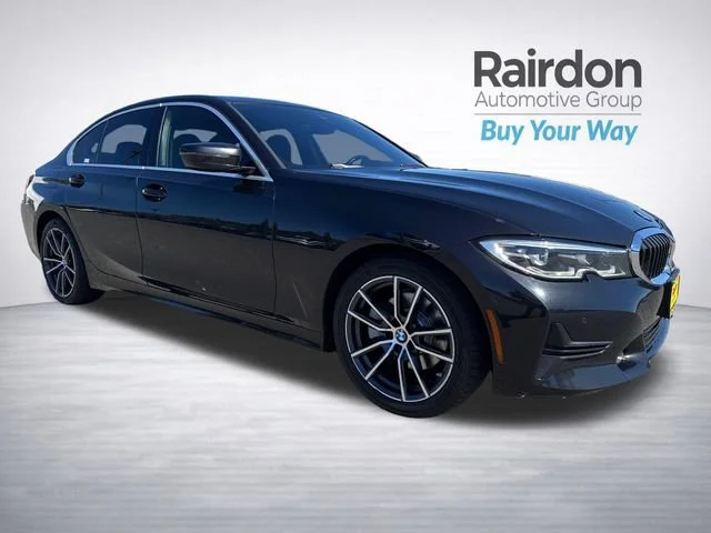 Used 2019 Black Sapphire Metallic BMW 330i image 1