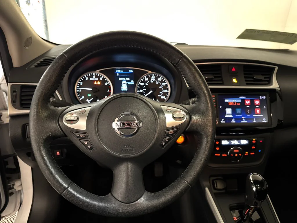 Certified Used 2019 White Nissan SV image 8