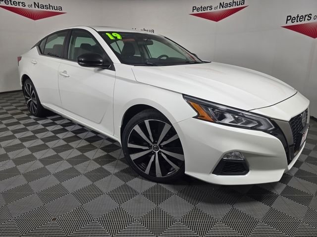 Used 2019 Pearl White Nissan 2.5 SR image 1
