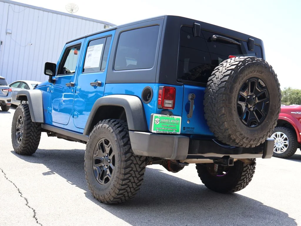 Used 2014 Blue Jeep Unlimited Sport image 3