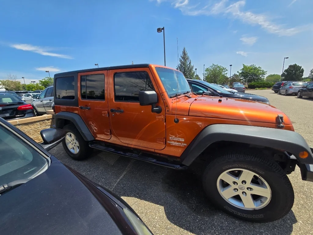 Used 2011 Mango Tango Pearlcoat Jeep Sport image 6