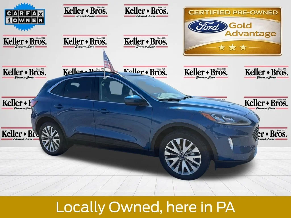 Certified Used 2022 Blue Metallic Ford Titanium image 1
