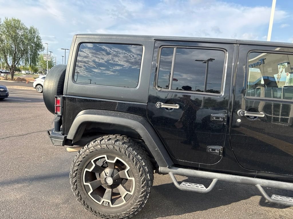 Used 2011 Black ClearCoat Jeep Unlimited Rubicon image 8