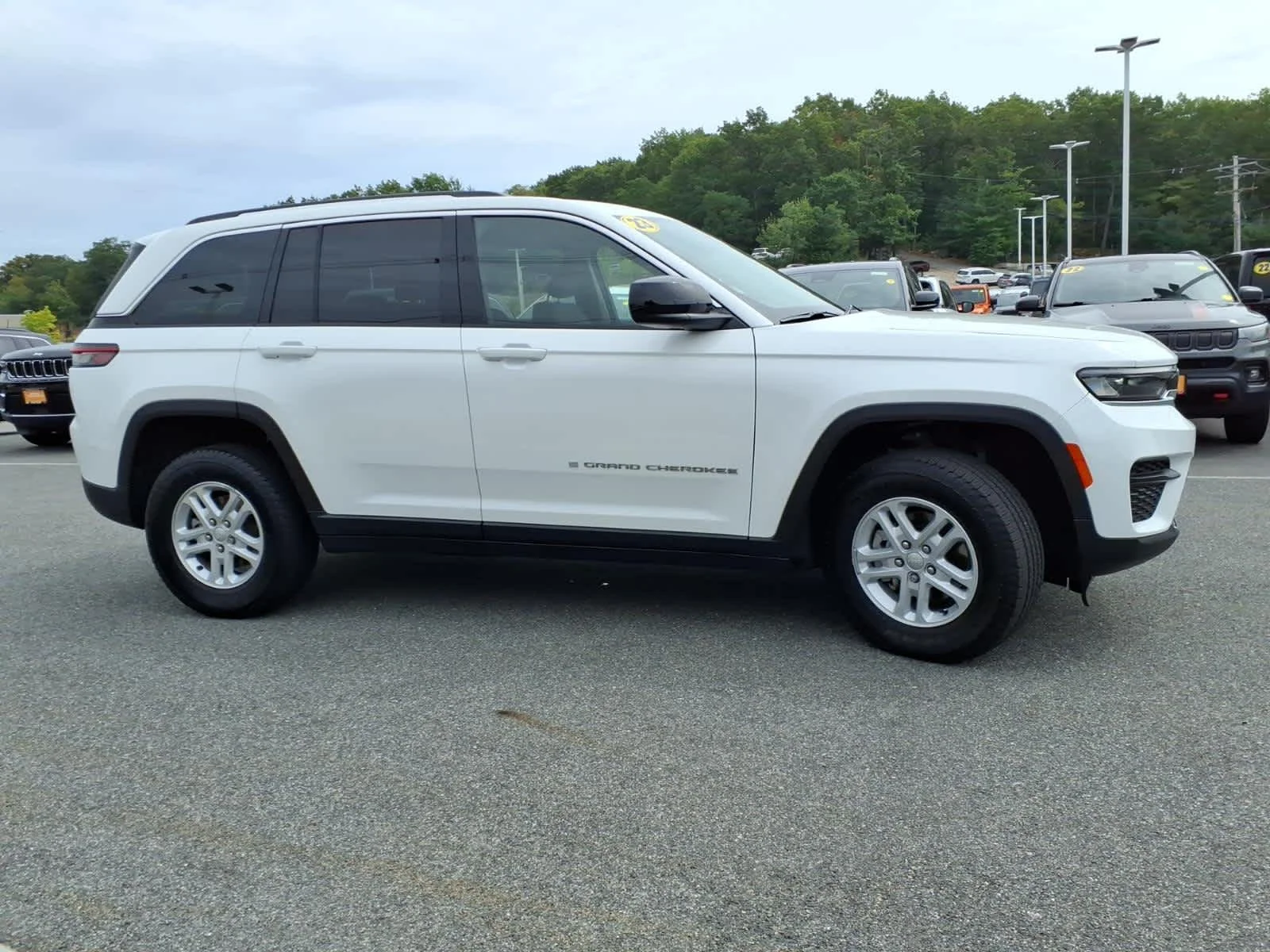 Used 2023 Bright White Clearcoat Jeep Laredo image 6