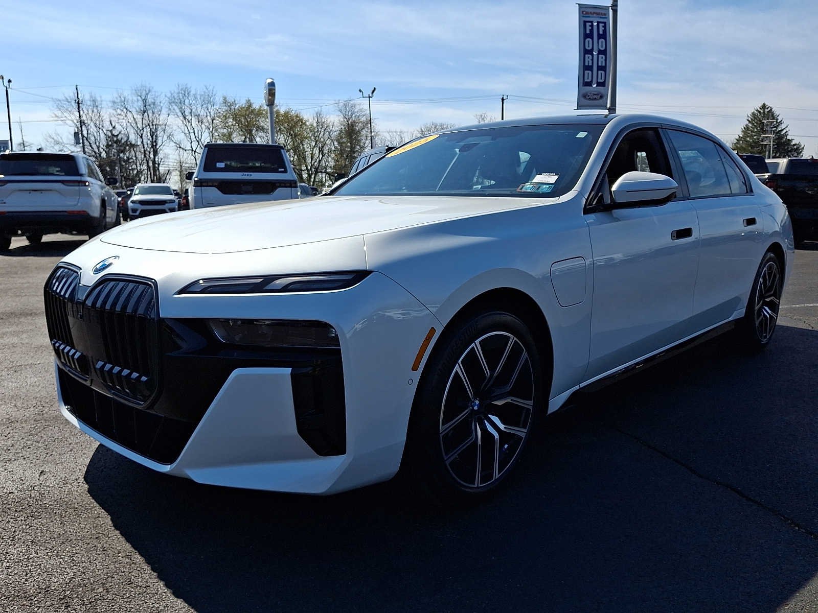 Used 2025 Mineral White Metallic BMW 750e xDrive image 3