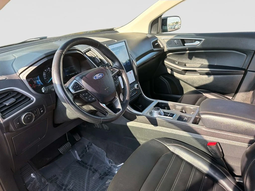 Used 2024 Agate Black Metallic Ford SEL image 22