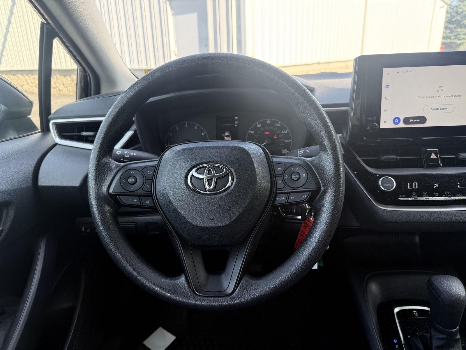 Used 2023 Midnight Black Metallic Toyota LE image 7