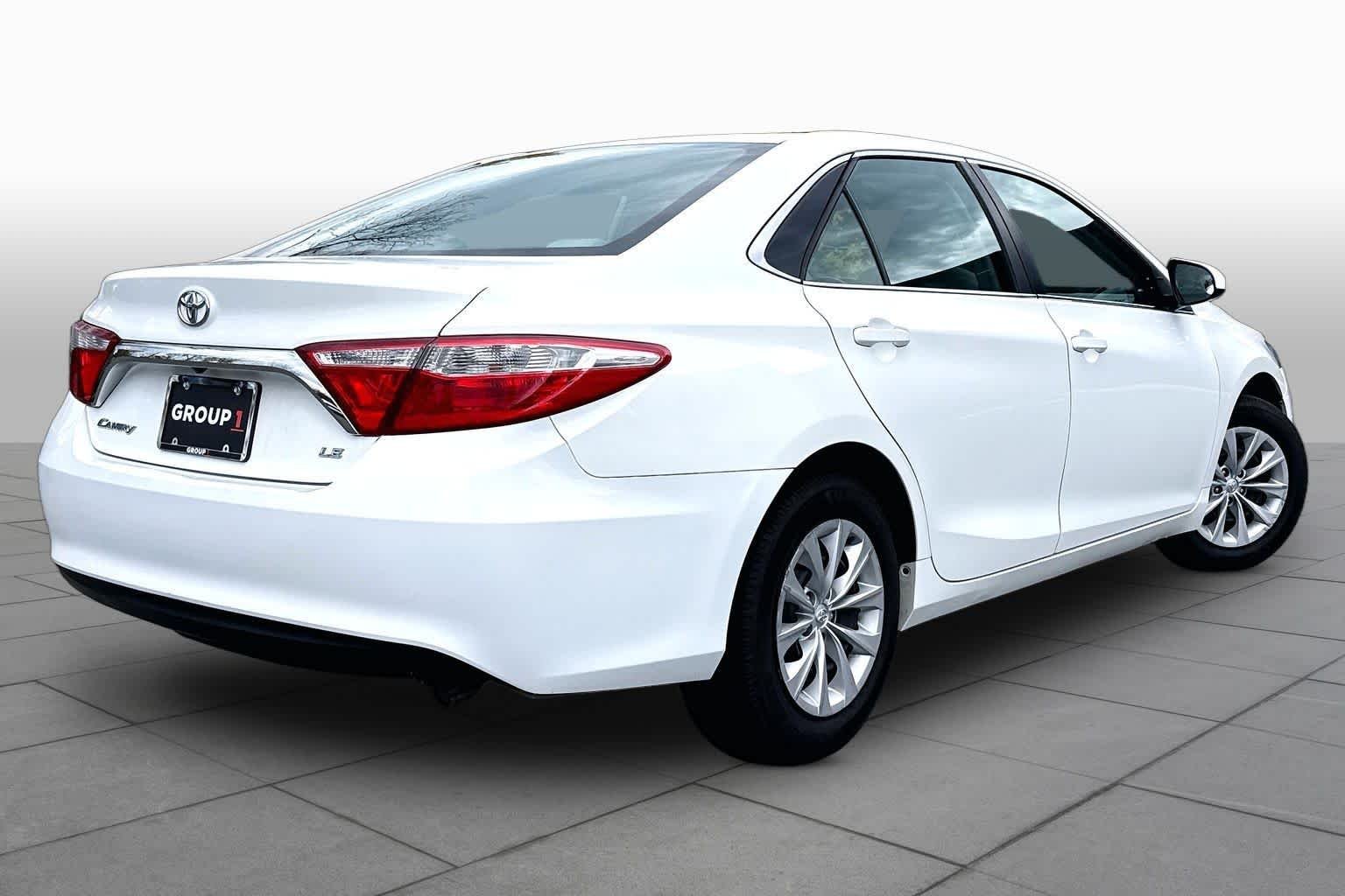 Used 2016 Super White Toyota LE image 13