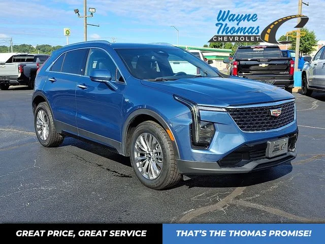 Used 2024 Blue Cadillac Premium Luxury image 1