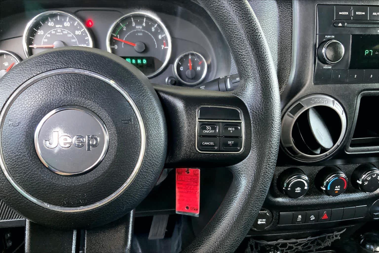 Used 2012 Black Forest Green Pearl Jeep Sport image 24