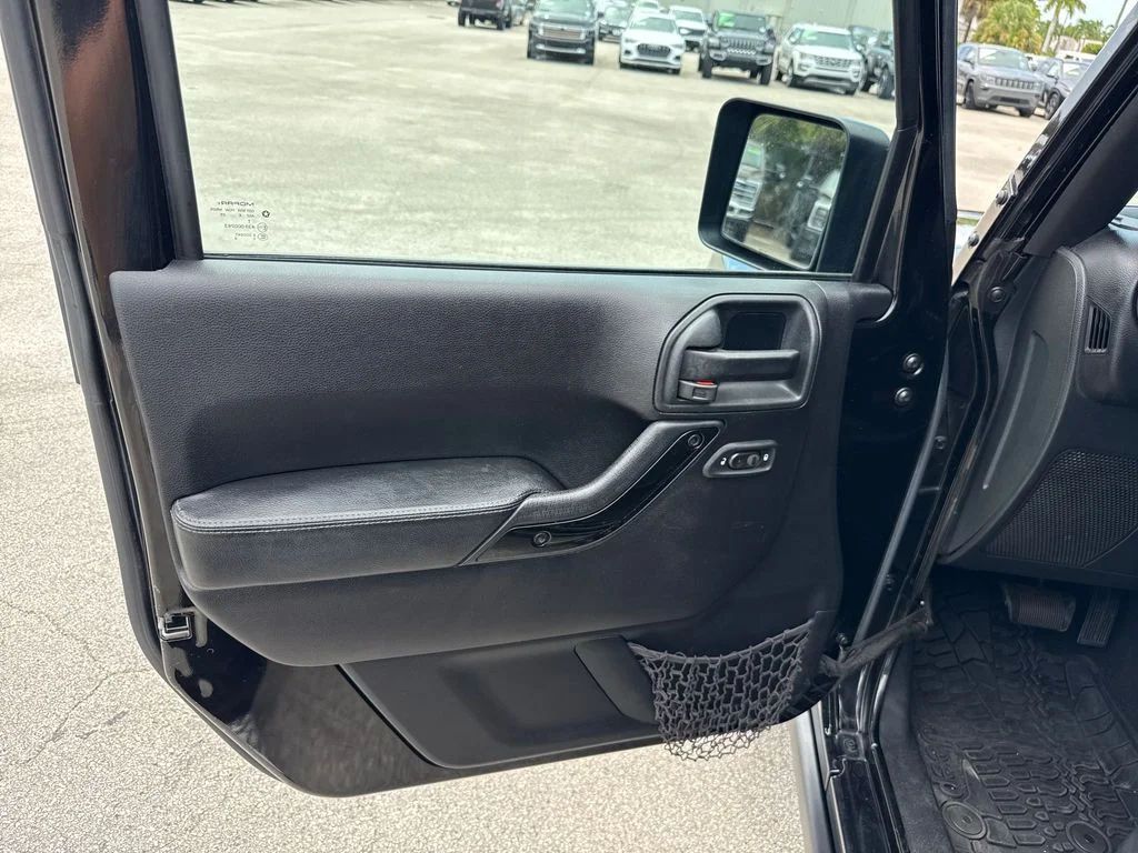 Used 2016 Black Jeep Unlimited Sahara image 11