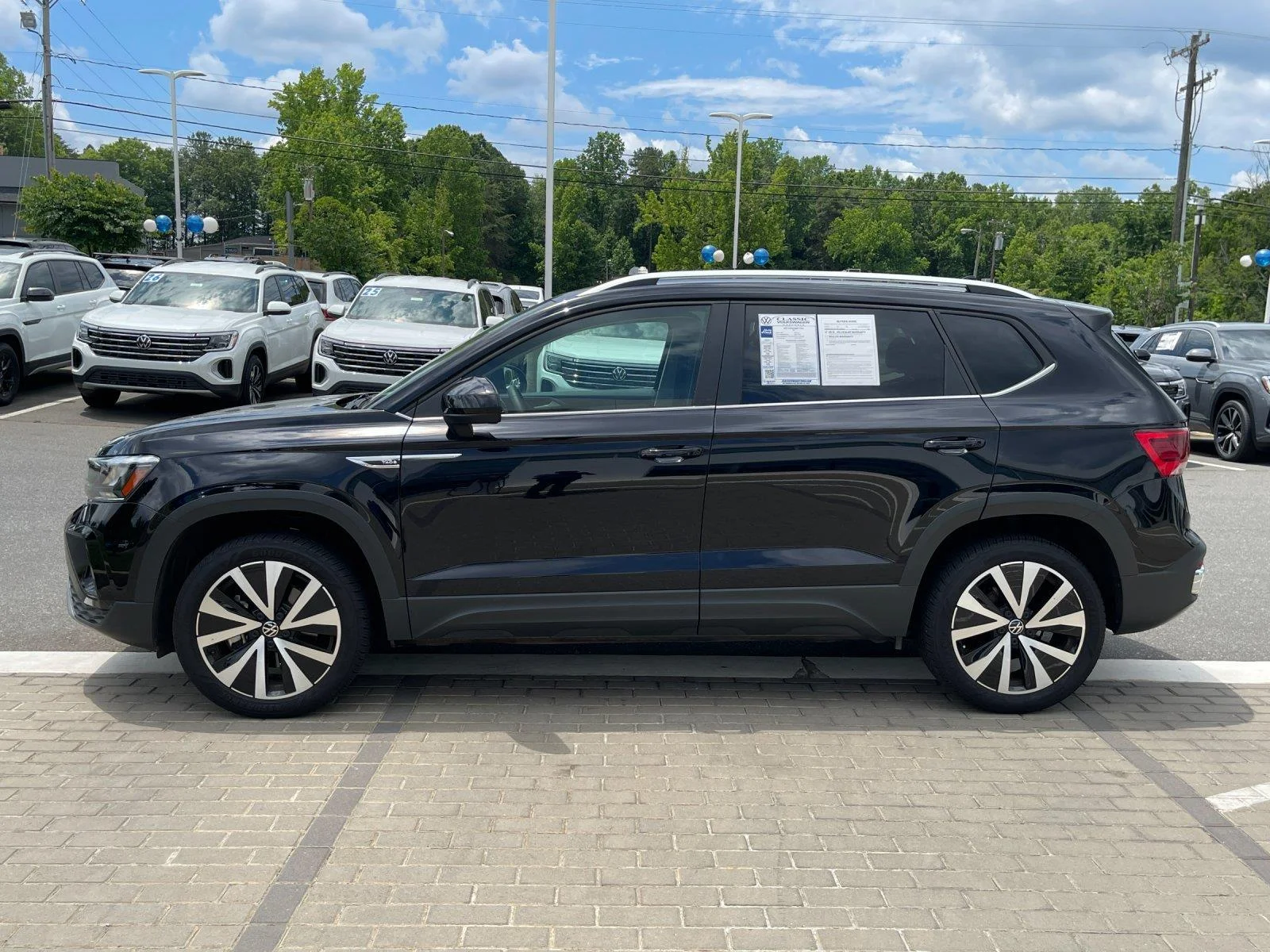 Certified Used 2024 Deep Black Pearl Volkswagen SE image 2