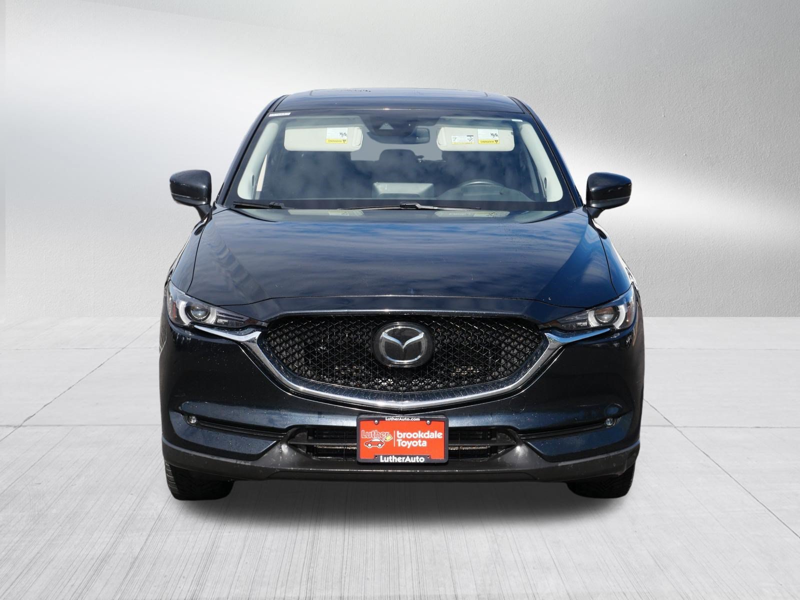 Used 2021 Mazda CX-5 Grand Touring Reserve with VIN JM3KFBAY4M0399385 for sale in Brooklyn Center, Minnesota