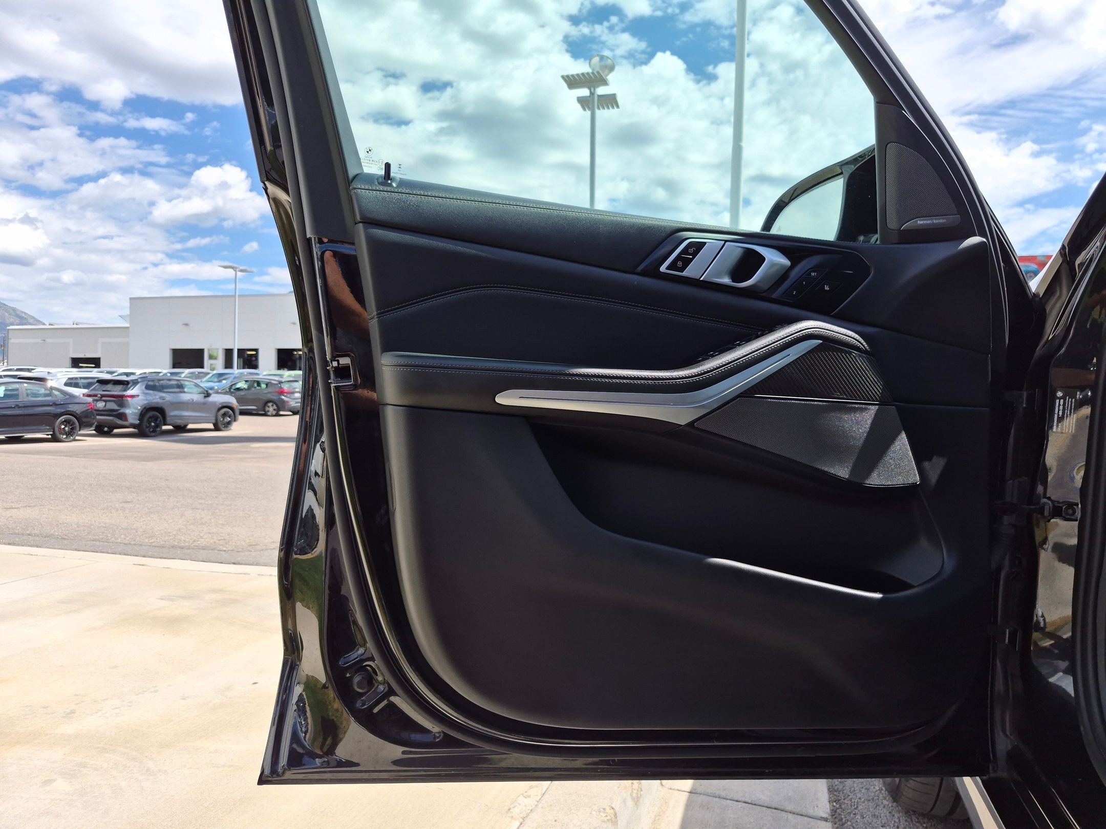 Used 2025 Black Sapphire Metallic BMW M60i image 13