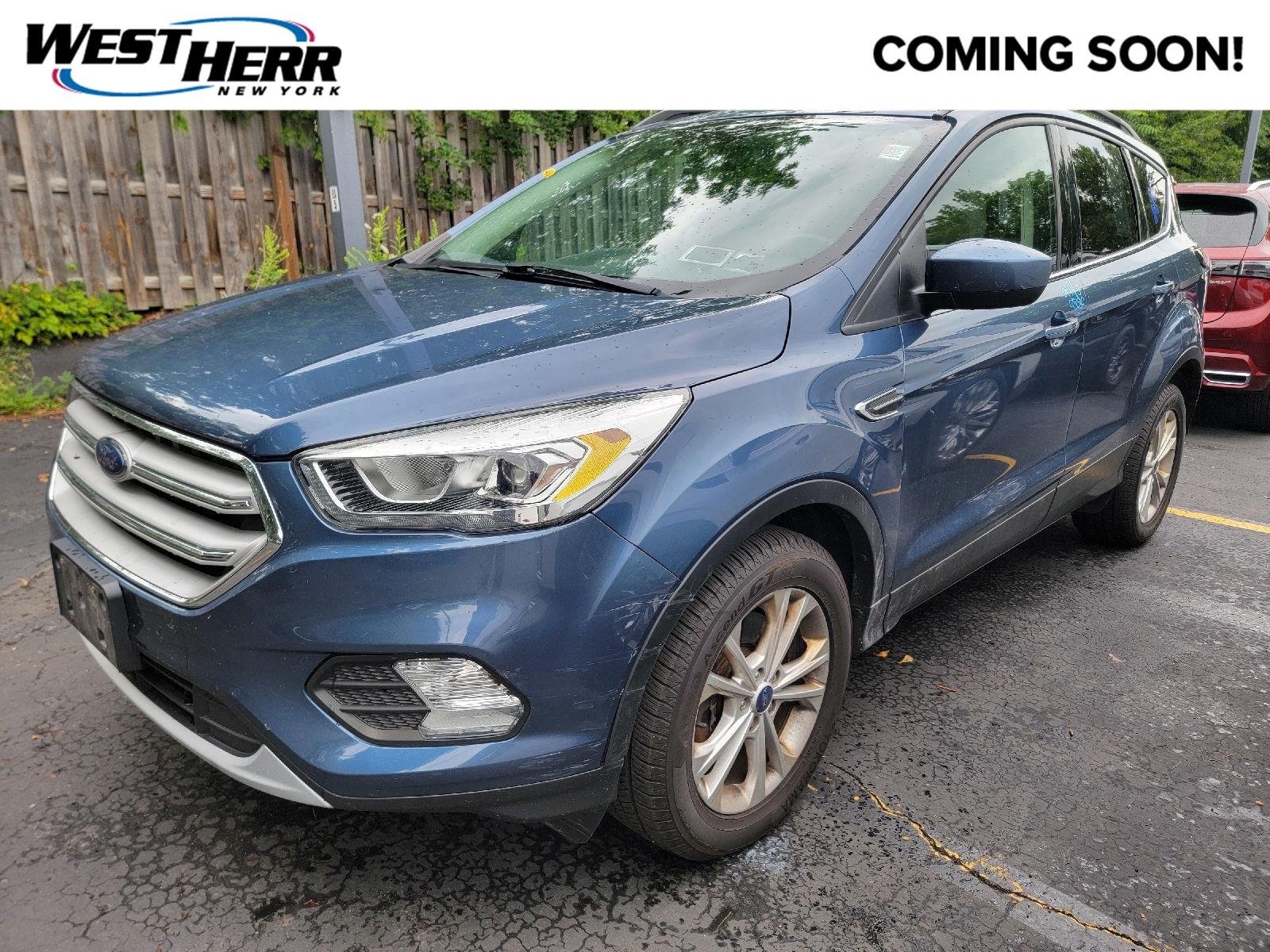 Used 2018 Blue Metallic Ford SEL image 1