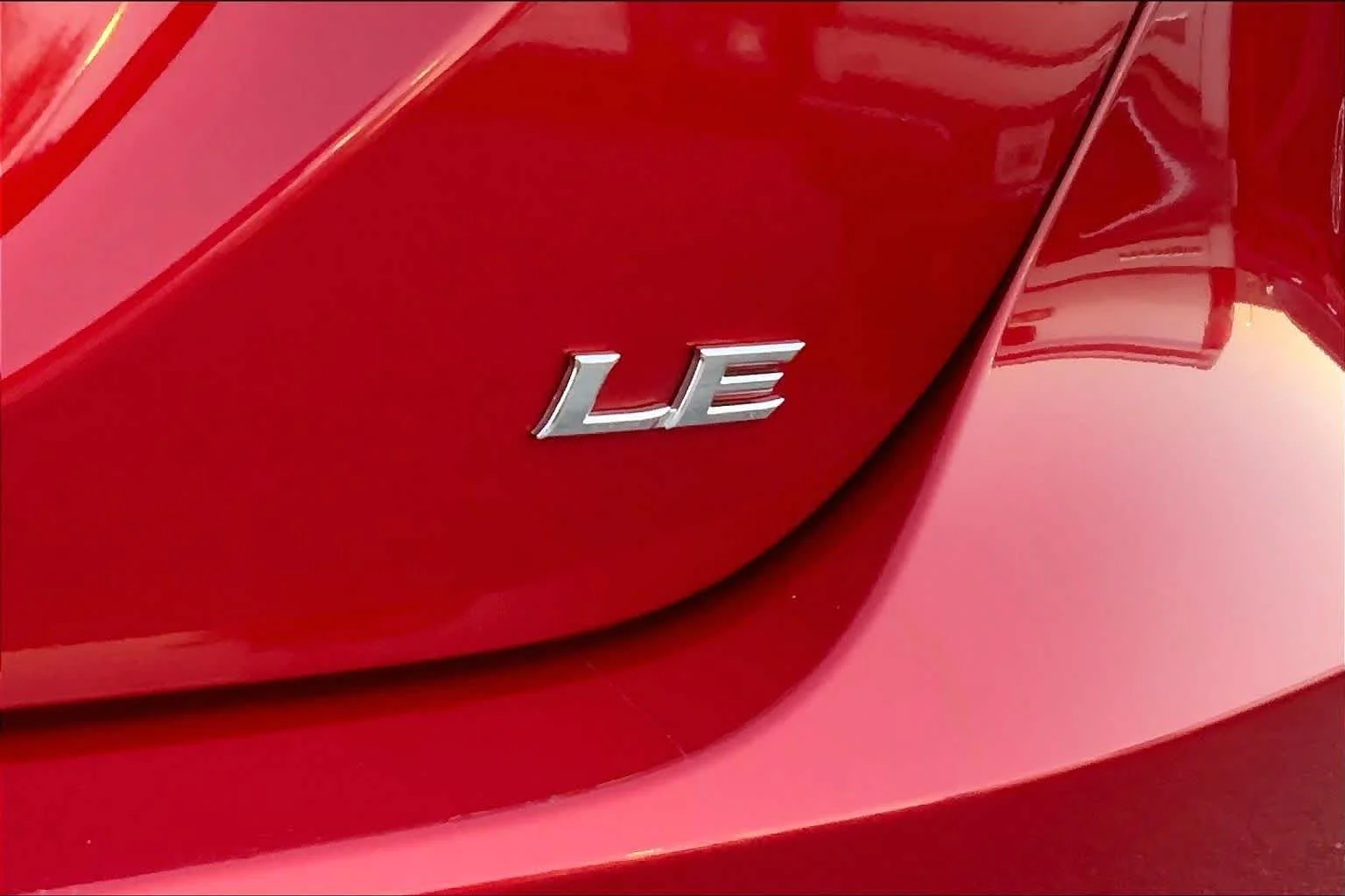 Used 2023 Supersonic Red Toyota LE image 9