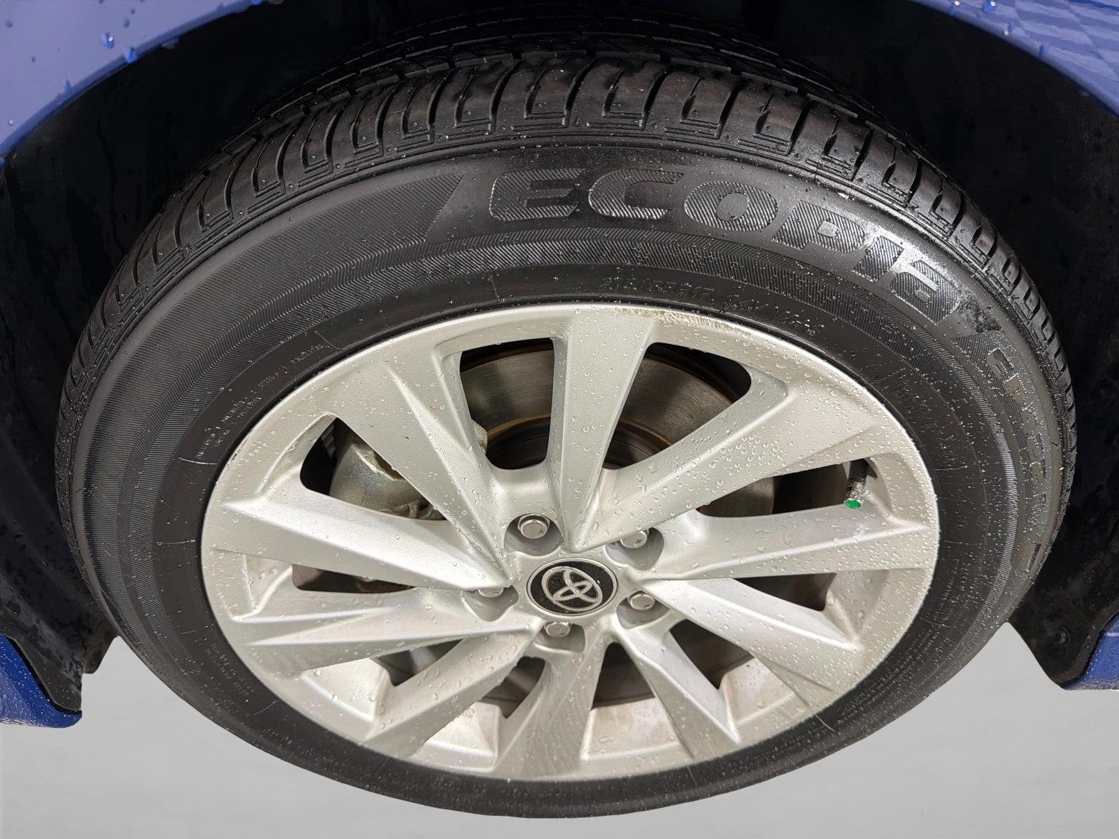 Used 2024 Reservoir Blue Toyota LE image 11