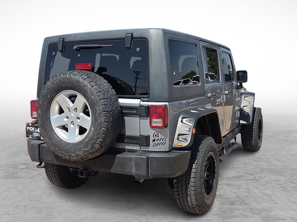 Used 2016 Billet Silver Metallic Clearcoat Jeep Unlimited Sport image 10
