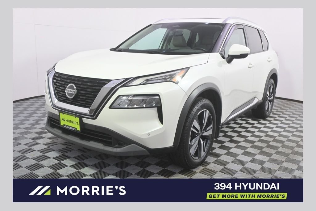 Used 2021 Pearl White Nissan SL image 1