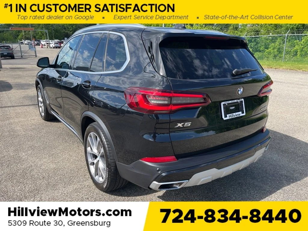 Certified Used 2022 Black Sapphire Metallic BMW xDrive40i image 3