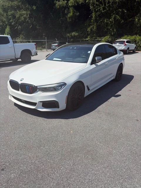 Used 2018 White BMW M550i xDrive image 1