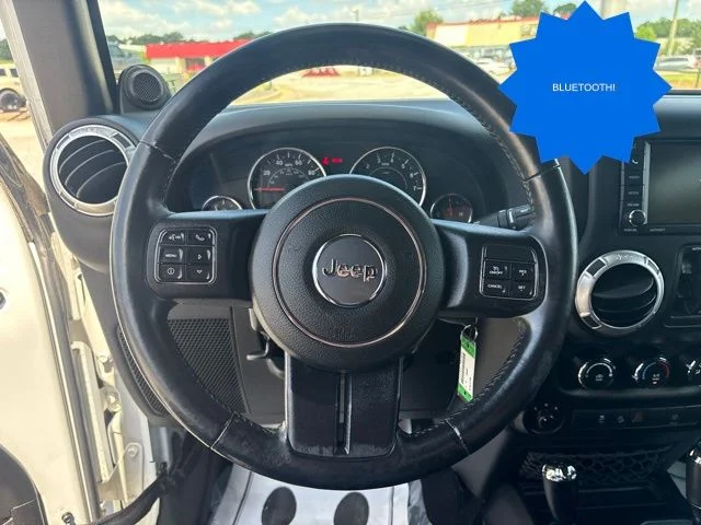 Used 2014 White Jeep Unlimited Sahara image 13