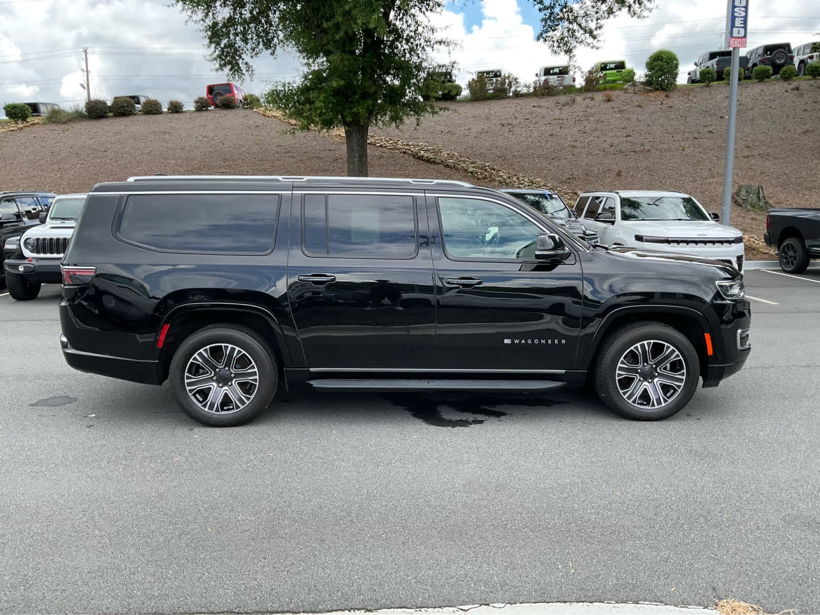 Used 2024 Diamond Black Crystal Pearlcoat Jeep Series II image 4