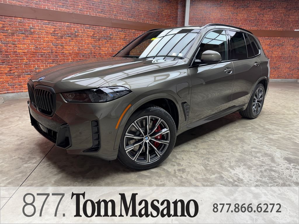 New 2026 Green BMW xDrive50e image 1