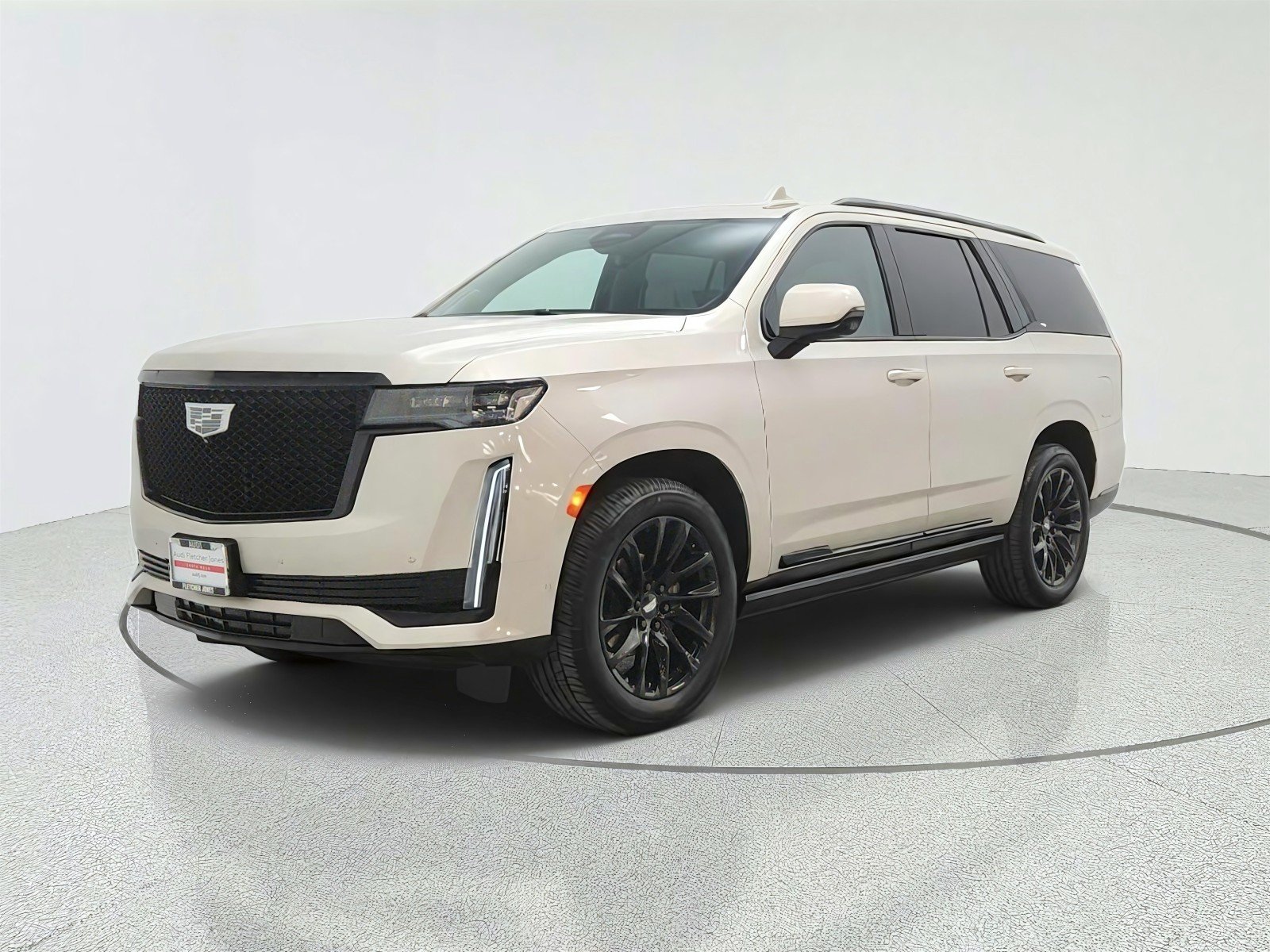 Used 2024 Sandstone Metallic Cadillac 4WD Sport Platinum image 1