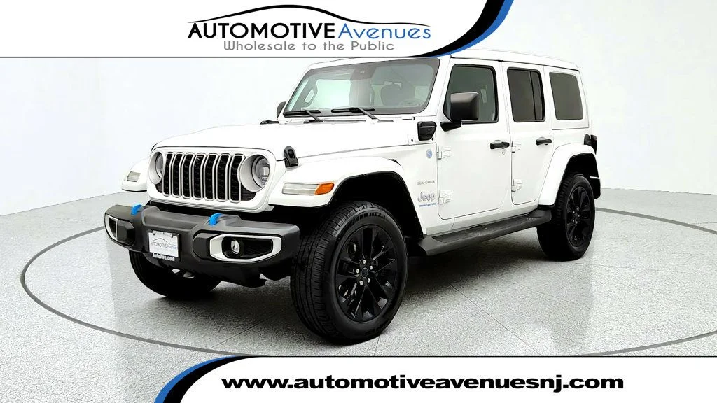 Used 2024 Bright White Clearcoat Jeep Sahara 4x4 w/ Sky One-Touch Top, Tech & Safety Pkgs image 1