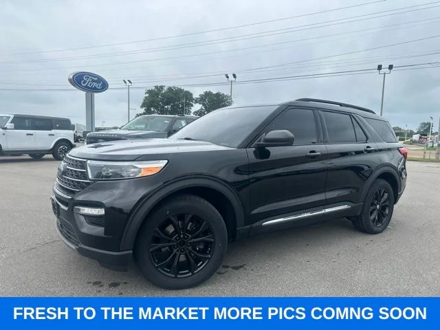 Used 2022 Agate Black Metallic Ford XLT image 1