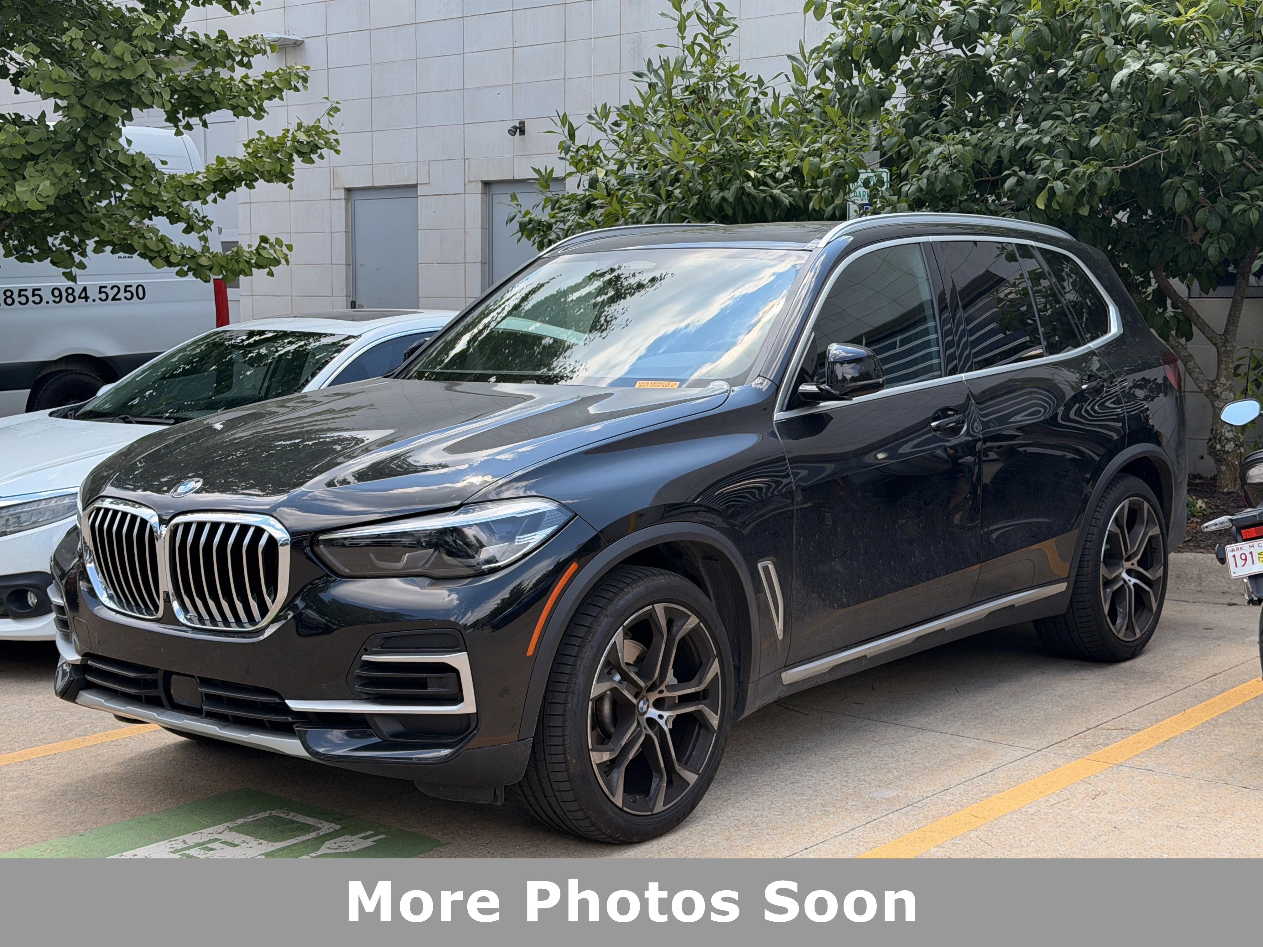 Certified Used 2023 Black Sapphire Metallic BMW xDrive40i image 1