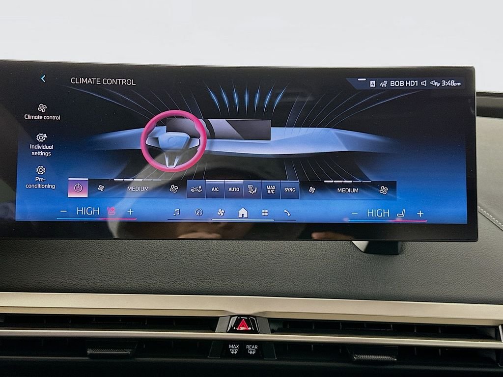 Used 2026 Black Sapphire Metallic BMW xDrive60 image 14
