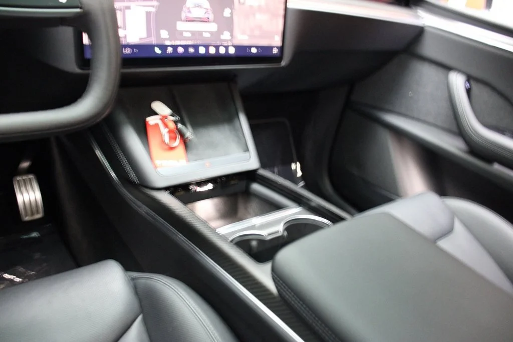 Used 2022 Solid Black Tesla Plaid image 45