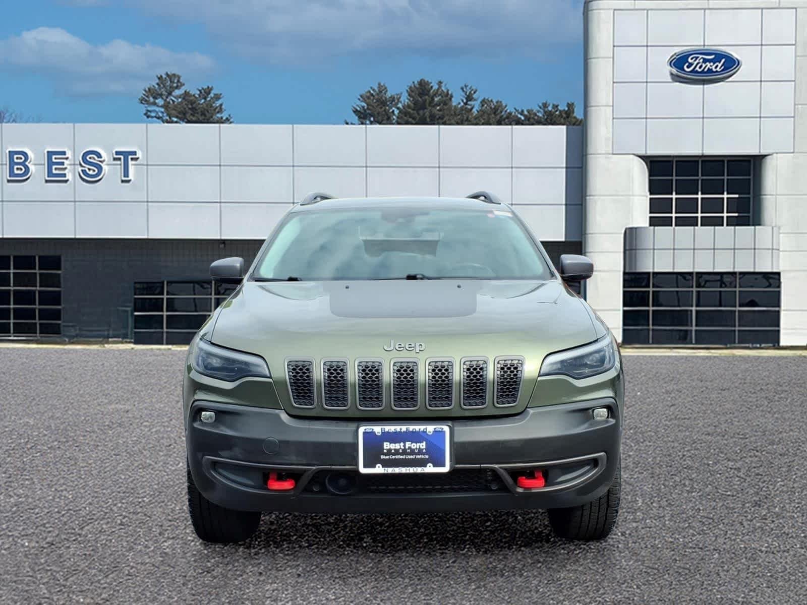 Used 2021 Olive Green Pearlcoat Jeep Trailhawk image 10