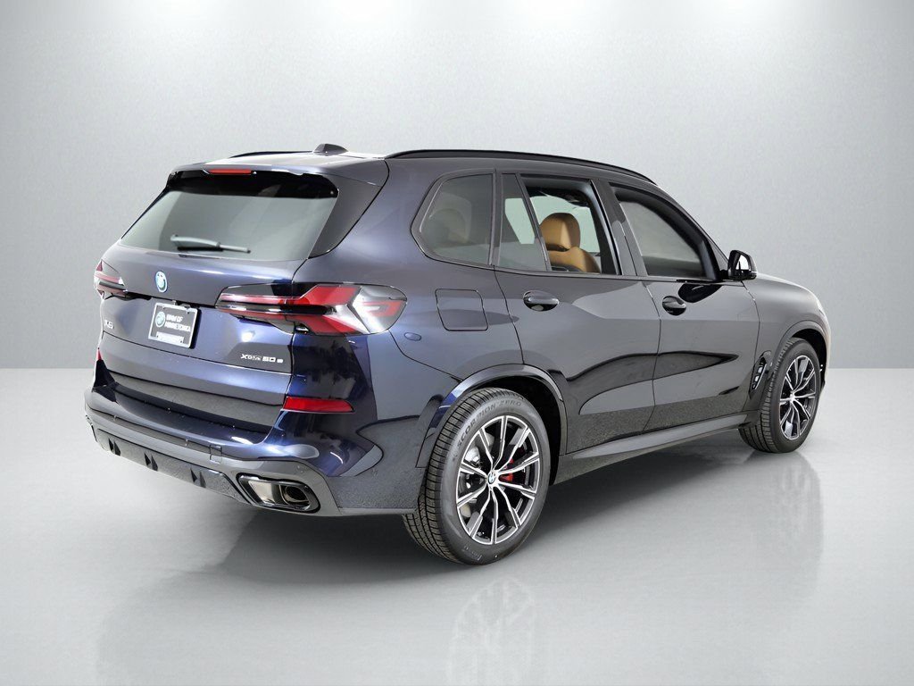 Used 2026 Carbon Black Metallic BMW xDrive50e image 10