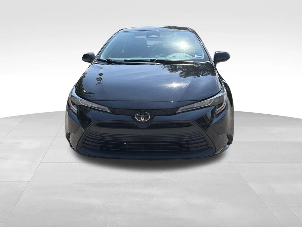 Used 2025 Black Toyota LE image 1