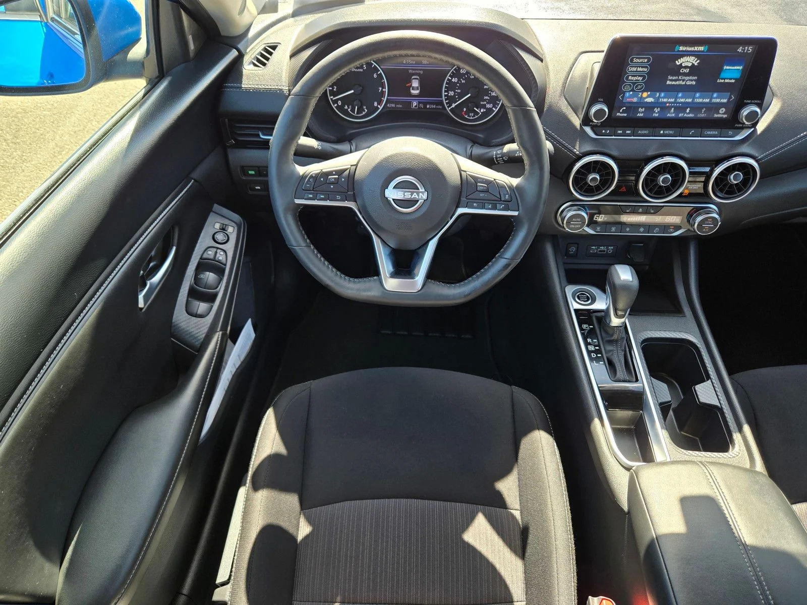 Used 2025 Electric Blue Metallic Nissan SV image 16