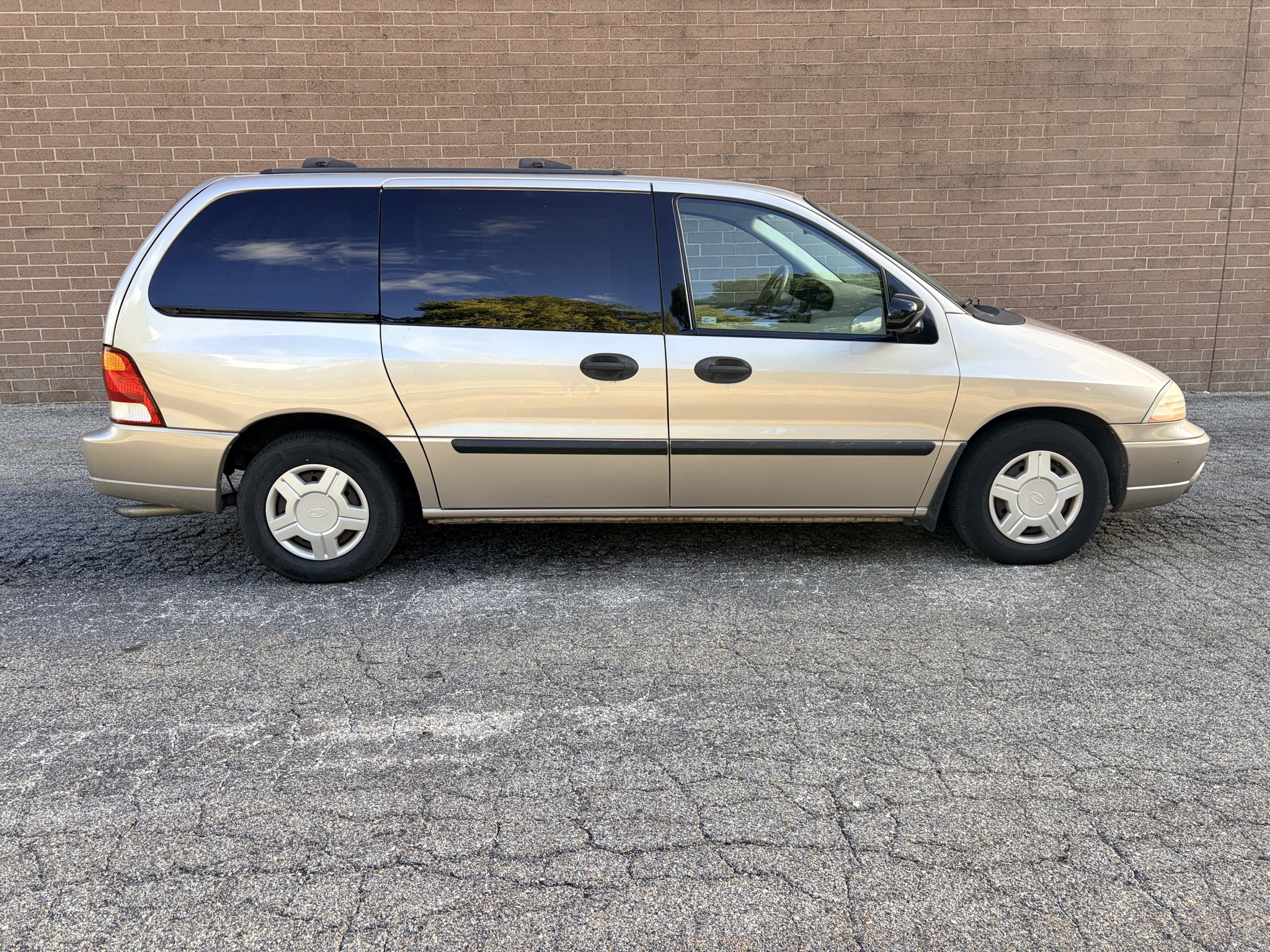 Used 2003 Silver Frost Clearcoat Metallic Ford LX image 6